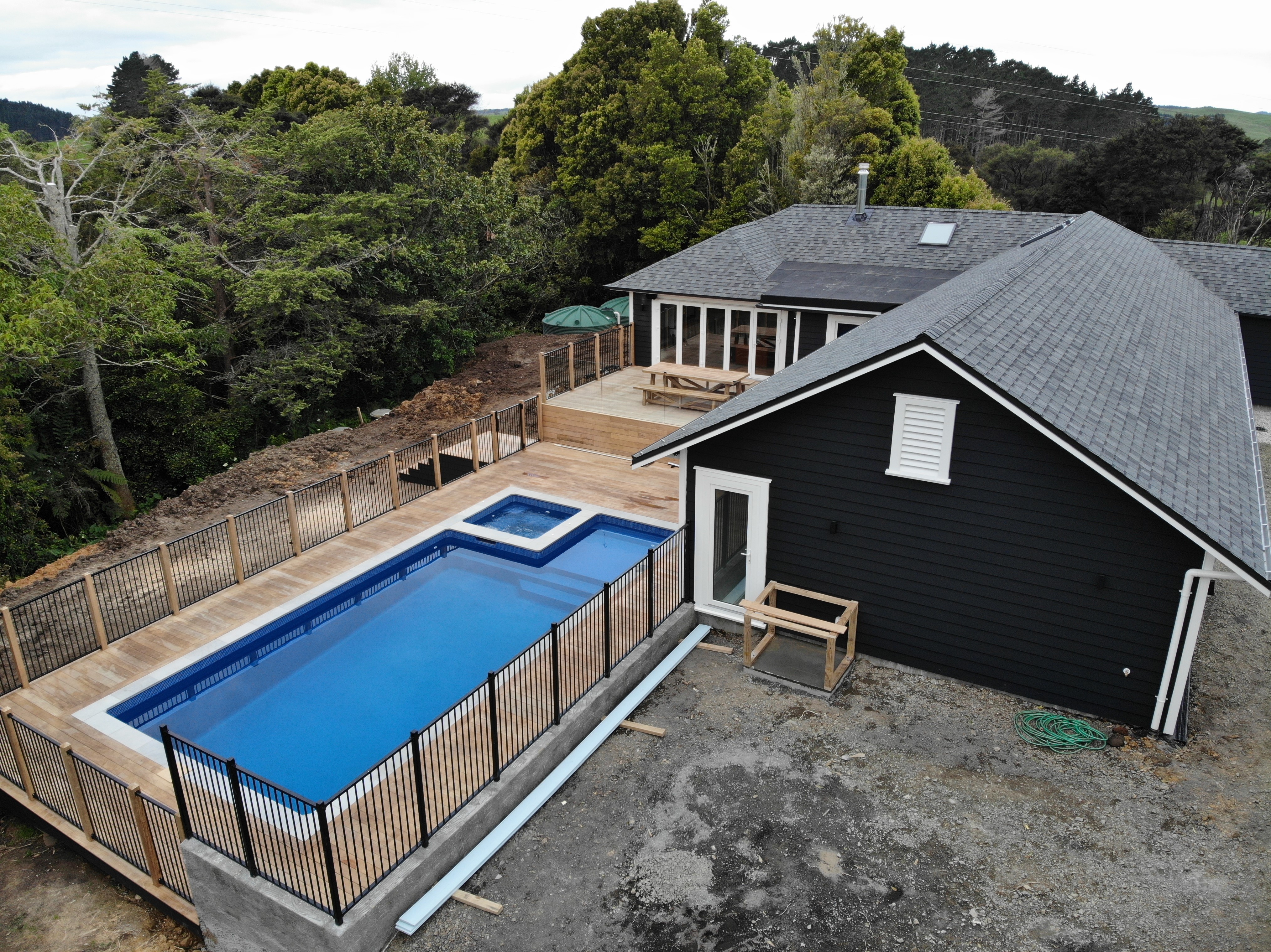 Aerial shot of house with pool 