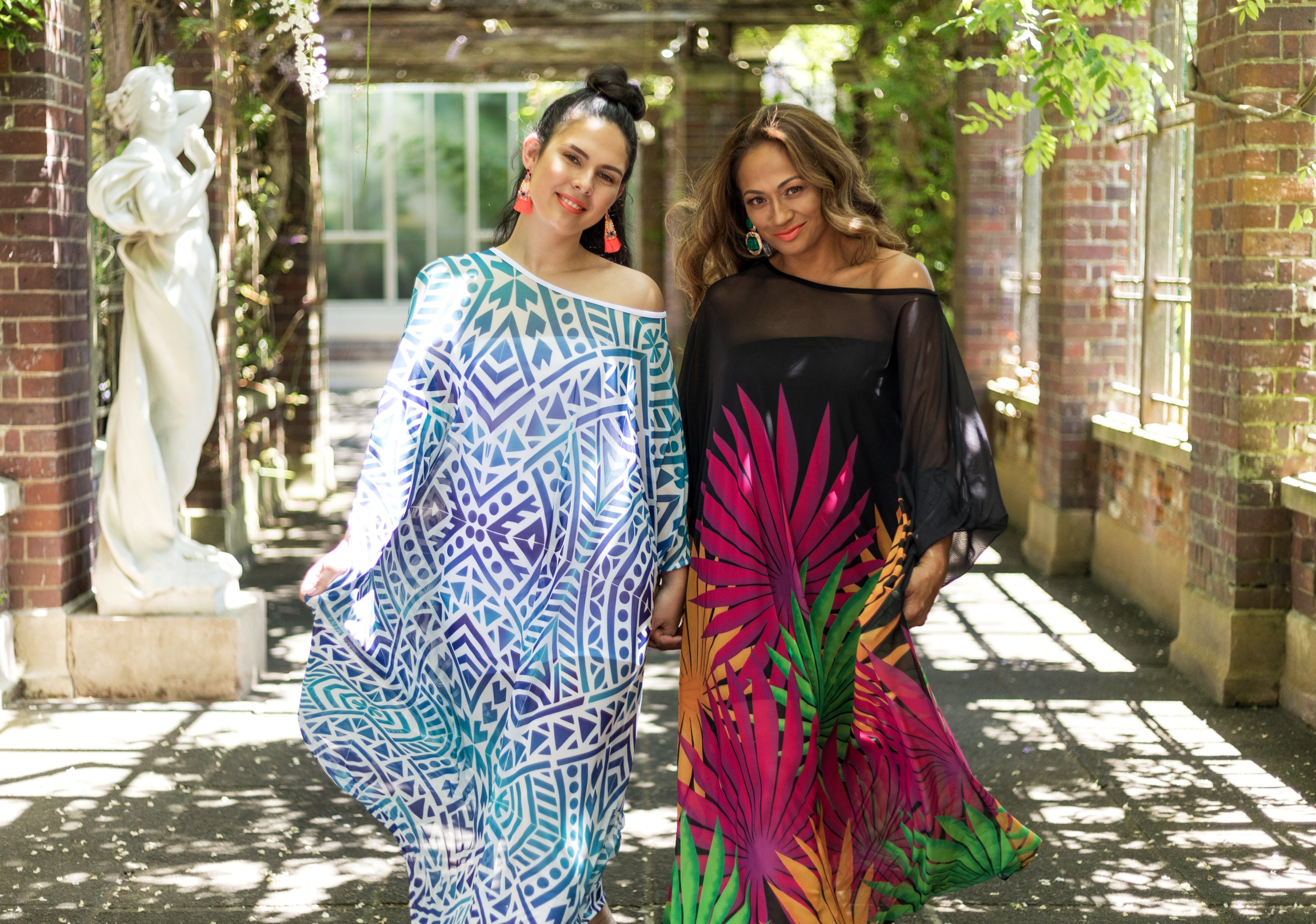 Two models wearing MENA designs 