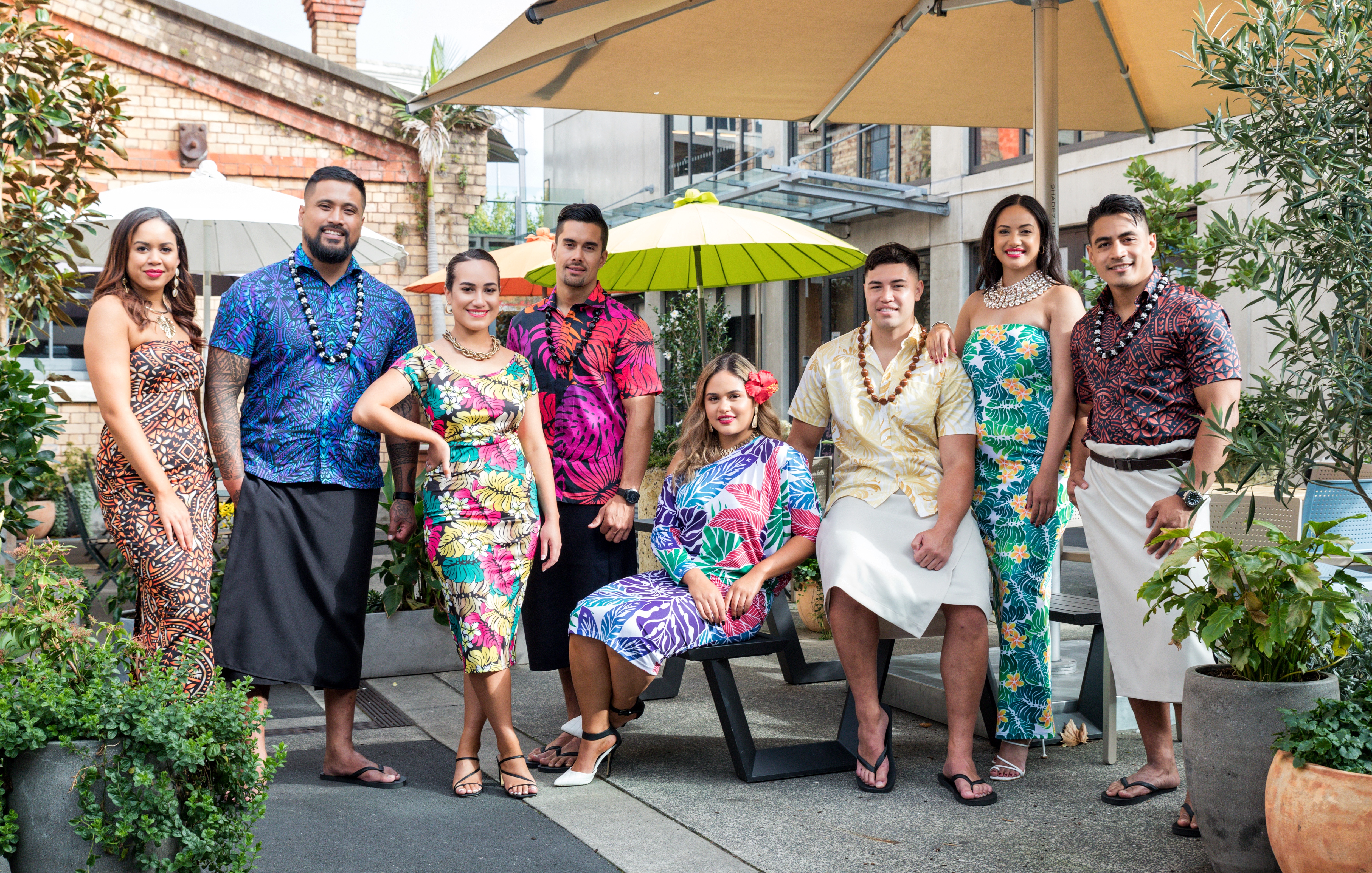 Mena family wearing their designs