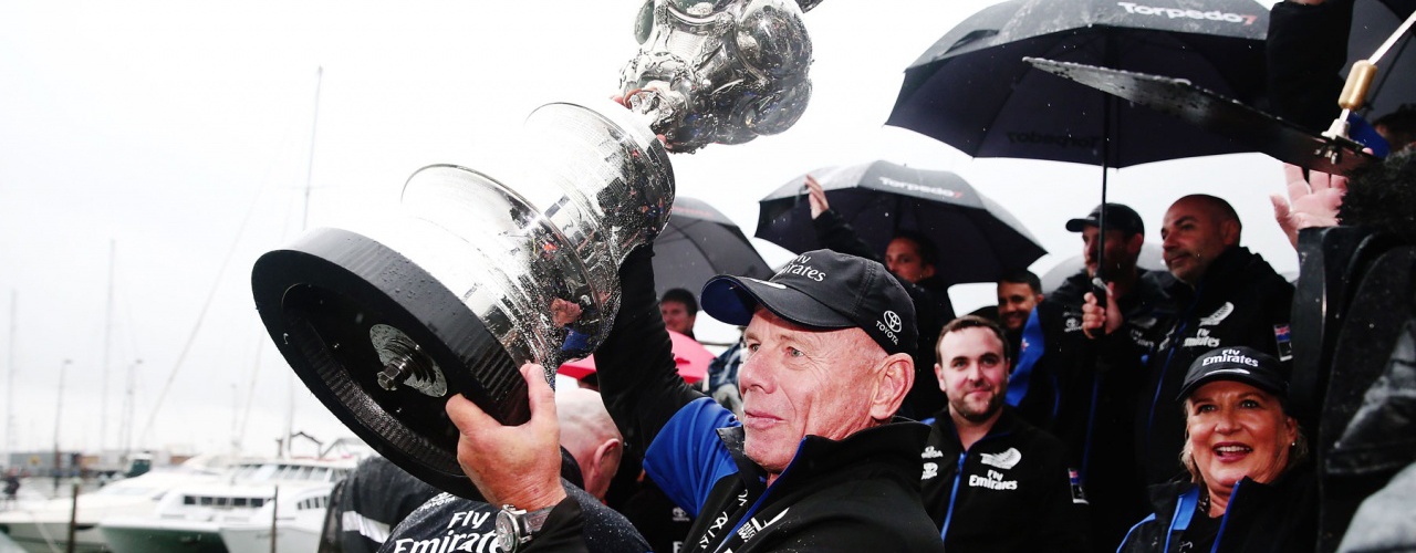 Grant Dalton holds the Americas Cup trophy at the Emirates Team New Zealand Homecoming parade