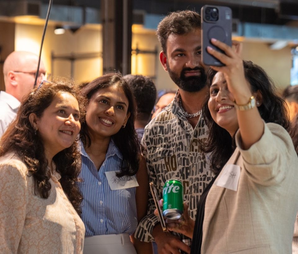 Tech Auckland - People - Migrants in Tech networking event selfie