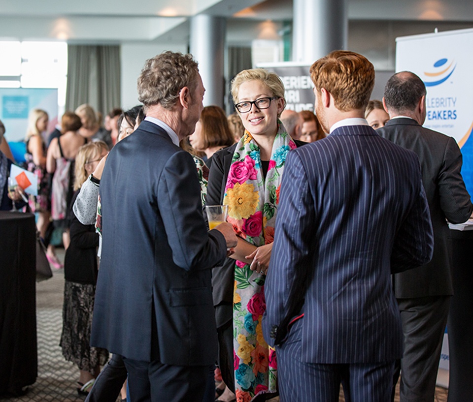 Group standing around networking