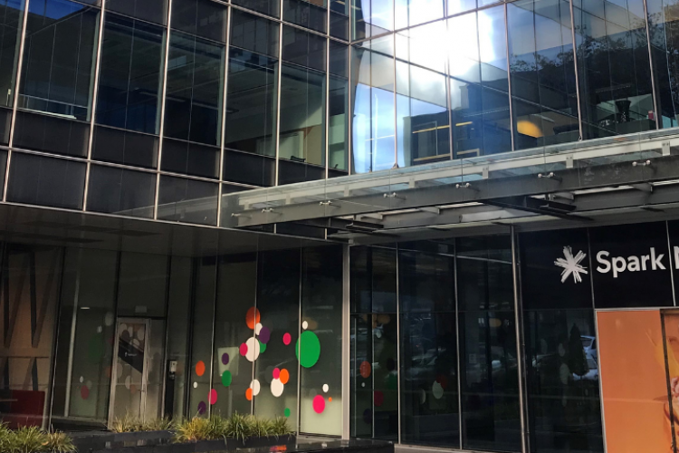 Image shows entrance to Spark building in Auckland